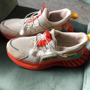 Orange and tan/cream Kicks. Only wore them once!